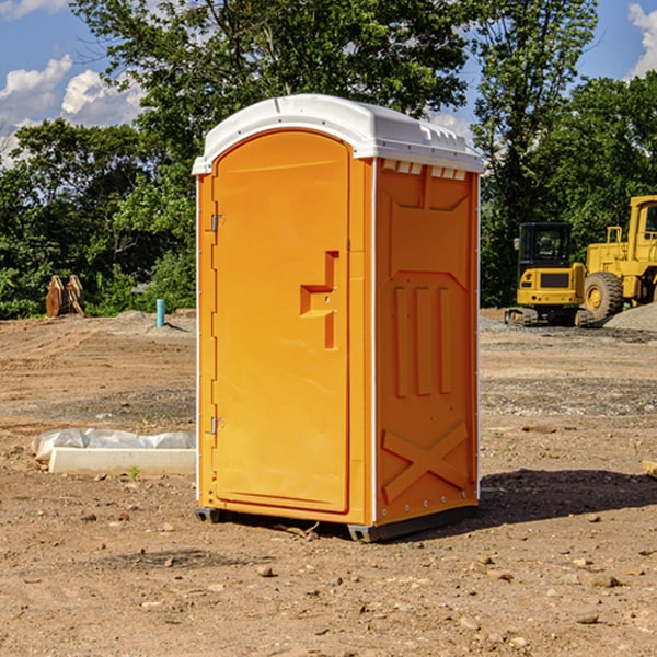 what is the cost difference between standard and deluxe portable toilet rentals in Uehling